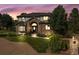 Stunning two-story brick home featuring a manicured lawn and mature landscaping, perfect for curb appeal at 5284 Taft Ct, Arvada, CO 80002