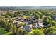 Scenic aerial shot of a tree-filled neighborhood, highlighting the community's serene and lush environment at 5284 Taft Ct, Arvada, CO 80002