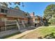 Building exterior showcasing stairs leading to the entrance at 5401 E Warren Ave # 204, Denver, CO 80222