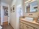 Modern bathroom with floating vanity and a walk-in shower at 2525 Nelson St, Lakewood, CO 80215