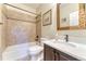 Well-appointed bathroom with shower-tub combination and vanity at 9274 Viaggio Way, Highlands Ranch, CO 80126