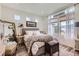 Bright bedroom featuring natural light and hardwood flooring at 5153 Andes Way, Denver, CO 80249