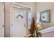 Bright entryway showcasing decorative glass features and stylish interior design at 5153 Andes Way, Denver, CO 80249