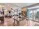 Spacious living room with hardwood floors, natural light and sliding doors to a patio at 5153 Andes Way, Denver, CO 80249