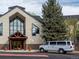 Attractive building exterior with a well-maintained garden and a conveniently parked passenger van at 6380 S Boston St # 191, Greenwood Village, CO 80111