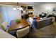 Open-concept living space with modern decor, dining area, and a cozy seating arrangement at 6380 S Boston St # 191, Greenwood Village, CO 80111