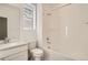 Full bathroom with tub/shower combo and white vanity at 4847 Astor Pl, Brighton, CO 80601