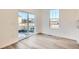 Bright dining area with sliding glass doors leading to backyard at 4847 Astor Pl, Brighton, CO 80601