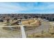 Aerial shot of the home set within a well-designed community park with winding paths and common areas at 25019 E Alder Dr, Aurora, CO 80016