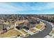 See an aerial of a home in a well-planned community, close to local amenities and green spaces at 25019 E Alder Dr, Aurora, CO 80016