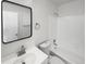 Clean bathroom with white vanity, toilet and bathtub at 4578 Malta St, Denver, CO 80249