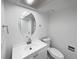 Clean bathroom with white vanity, toilet, and bathtub at 4578 Malta St, Denver, CO 80249