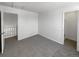 Upstairs bedroom with access to upper hallway and closet at 4578 Malta St, Denver, CO 80249