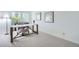 Bright room with a modern work space that includes a desk and comfortable chair at 13093 W Cedar Dr # 121, Lakewood, CO 80228