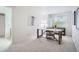 View of bedroom features a modern workspace and light-filled atmosphere from a bright window at 13093 W Cedar Dr # 121, Lakewood, CO 80228