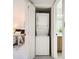 Convenient laundry closet is nestled between the bathroom and a bedroom at 13093 W Cedar Dr # 121, Lakewood, CO 80228