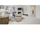 Cozy living area with fireplace, balcony, and comfortable seating arrangement at 13093 W Cedar Dr # 121, Lakewood, CO 80228