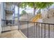 Private outdoor patio with rock area and a serene view of the surrounding landscape at 13093 W Cedar Dr # 121, Lakewood, CO 80228