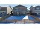 Private backyard with wood fence and snow covered ground at 12915 E 102Nd Pl, Commerce City, CO 80022