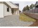 A manicured lawn is adjacent to a gravel area in this backyard. The yard also features a privacy fence at 1361 Art Dr, Berthoud, CO 80513