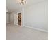 Spacious basement with neutral walls and carpet, and open doorway to the staircase at 1361 Art Dr, Berthoud, CO 80513