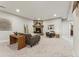 Cozy finished basement with a stone fireplace and seating area, perfect for relaxing at 1361 Art Dr, Berthoud, CO 80513
