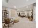 Spacious finished basement with neutral colors, plush carpet, and ample room for relaxing and entertaining at 1361 Art Dr, Berthoud, CO 80513