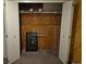 Inside a closet with exposed wood paneling, storage shelves, and fixtures at 5171 S Quintero St, Centennial, CO 80015