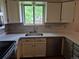 A bright kitchen featuring stainless steel appliances and white countertops at 5171 S Quintero St, Centennial, CO 80015