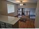 Open living space with wood floors, a ceiling fan, and great natural light at 5171 S Quintero St, Centennial, CO 80015