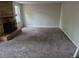 Spacious living room with a brick fireplace at 5171 S Quintero St, Centennial, CO 80015