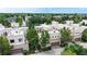 Aerial view of modern homes surrounded by lush greenery at 8041 E 29Th Ave, Denver, CO 80238