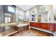 This well-appointed primary bathroom features a walk-in shower, soaking tub, and dual vanities at 8041 E 29Th Ave, Denver, CO 80238