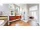 Elegant bathroom with a double vanity, modern fixtures, and separate toilet room at 8041 E 29Th Ave, Denver, CO 80238
