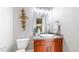 Modern bathroom with sleek vanity, updated fixtures, and contemporary design at 8041 E 29Th Ave, Denver, CO 80238