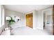 Cozy bedroom with neutral tones, plush carpeting, closet, and ample natural light at 8041 E 29Th Ave, Denver, CO 80238