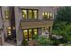Beautiful modern townhouse with large windows and a cozy patio view at 8041 E 29Th Ave, Denver, CO 80238