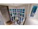Lofted view of the living room features soaring ceilings, large windows, and modern furnishings at 8041 E 29Th Ave, Denver, CO 80238