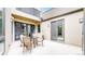 Enjoy outdoor dining and entertaining on this spacious patio with fireplace and seating area at 8041 E 29Th Ave, Denver, CO 80238