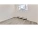 Spacious bedroom with neutral walls and wood-look floors at 1445 Yosemite St # 12, Denver, CO 80220