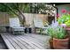 Outdoor deck with lounge chairs and lush foliage, perfect for relaxing at 7121 E Arkansas Ave, Denver, CO 80224