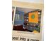 Vintage decor magazine image of a colorful home office with shelves at 7121 E Arkansas Ave, Denver, CO 80224