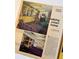 Vintage Empire Homes magazine article featuring a finished basement living room with colorful plaid decor at 7121 E Arkansas Ave, Denver, CO 80224