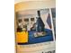 Vintage magazine image showing a living room with modern fireplace and yellow sofa at 7121 E Arkansas Ave, Denver, CO 80224