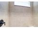 Close up of the newly renovated shower and tiling at 8633 Middle Fork St, Littleton, CO 80125