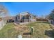 Well-maintained backyard featuring a hot tub, green grass, and a patio area at 20898 E Hamilton Ave, Aurora, CO 80013