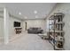 Finished basement featuring plush carpet, modern recessed lighting, and a comfortable seating area at 20898 E Hamilton Ave, Aurora, CO 80013
