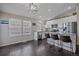 Well-lit kitchen with granite countertops, breakfast bar, and ample cabinet space at 20898 E Hamilton Ave, Aurora, CO 80013