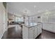 Modern kitchen featuring a granite island and stainless steel appliances at 20898 E Hamilton Ave, Aurora, CO 80013