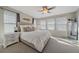 Serene main bedroom with abundant natural light, neutral tones, and elegant decor at 20898 E Hamilton Ave, Aurora, CO 80013